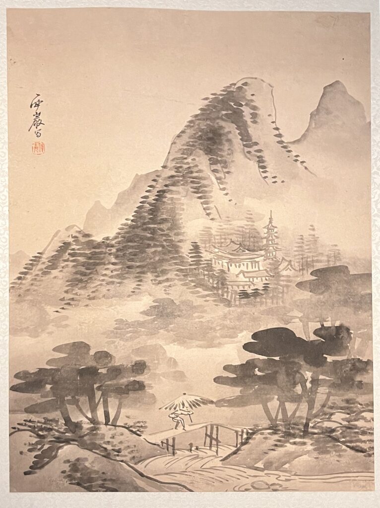 A landscape art work using different shades of black ink depicting a mountain area with a monastery nestled at its base. A character with an umbrella passes over a bridge in the foreground.